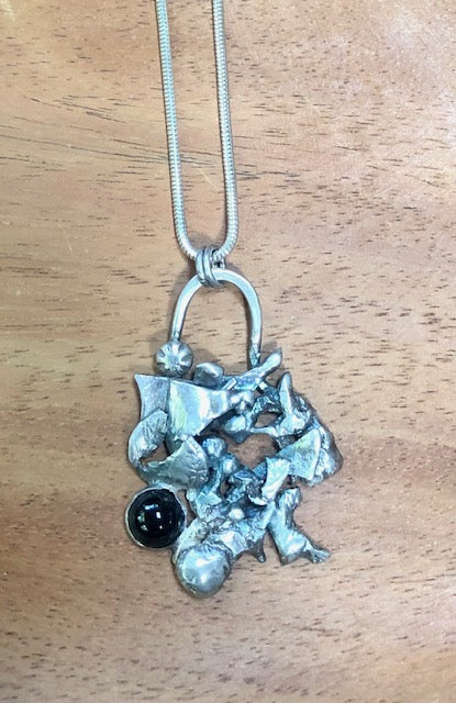 Silver abstract necklace with black onyx
