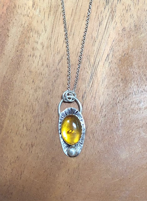 Silver and amber necklace