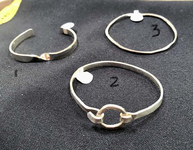 Three Sterling Silver bracelets