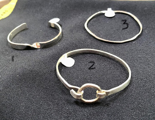 Three Sterling Silver bracelets